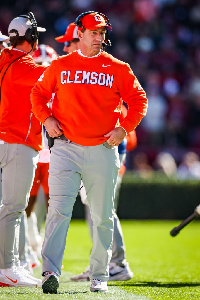 Head Coach Dabo Swinney of the Clemson Tigers watches his team during a football game.