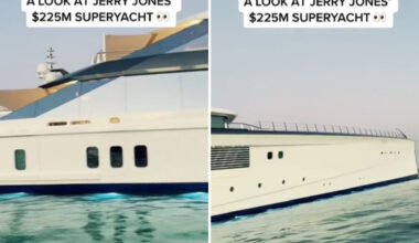 A luxury superyacht valued at $225 million, showcased against a calm water backdrop.