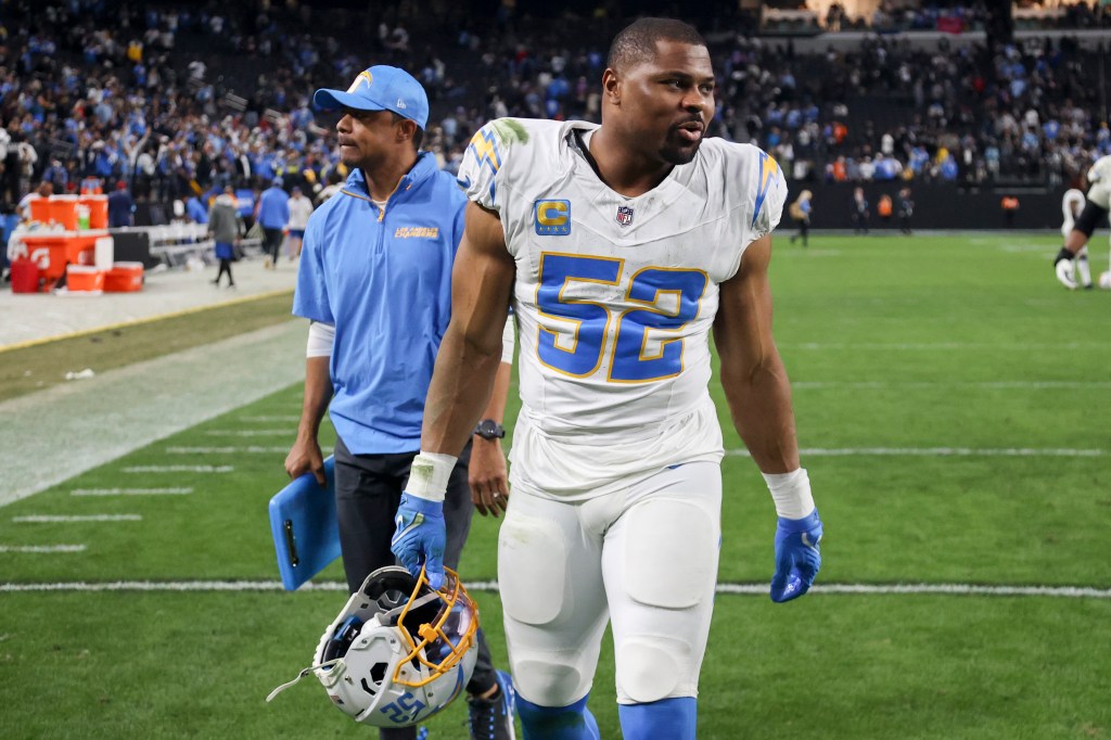 Khalil Mack #52 of the Los Angeles Chargers walks off the field after a win against the Las Vegas Raiders.