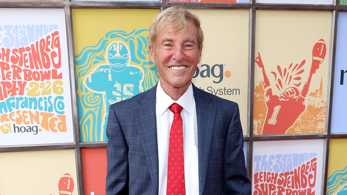 Leigh Steinberg smiles on red carpet
