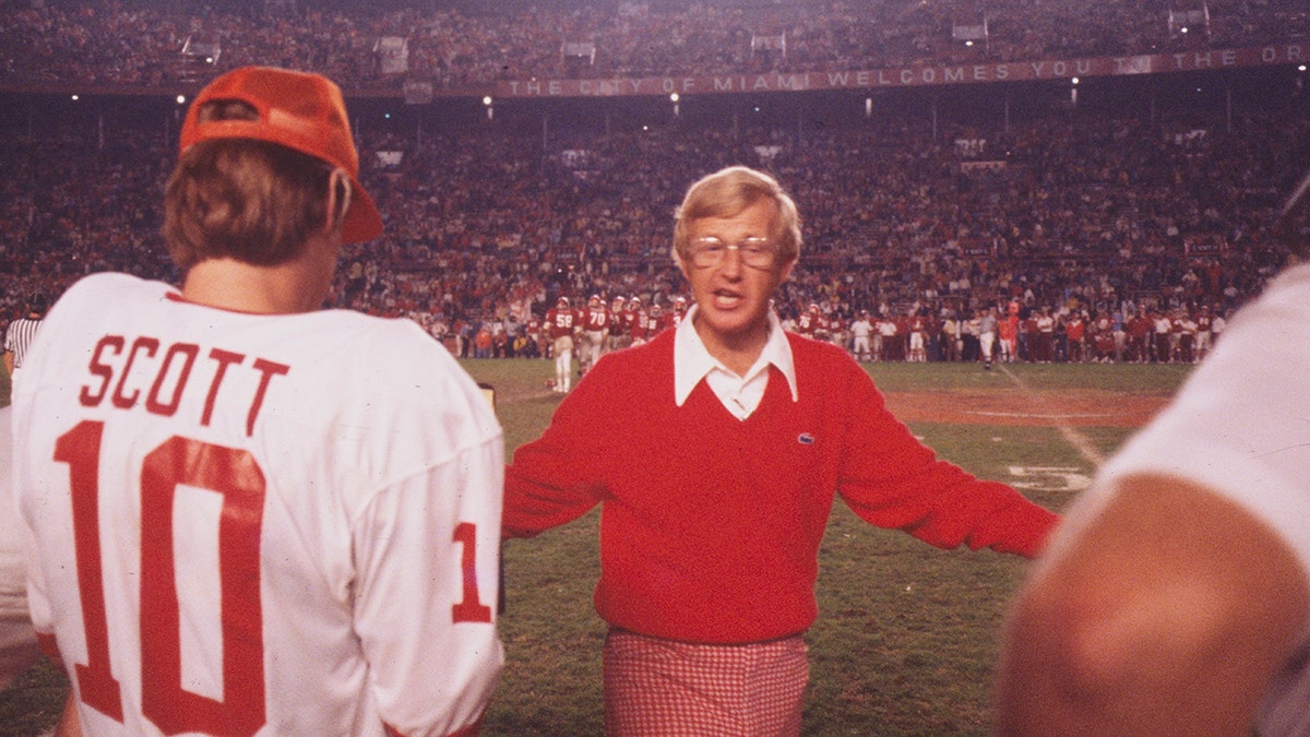 Lou Holtz with Arkansas