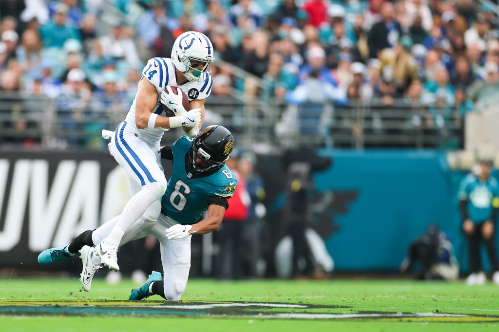Greg Newsome II tackles Alec Pierce during the Jaguars' December 2025 game against the Colts.