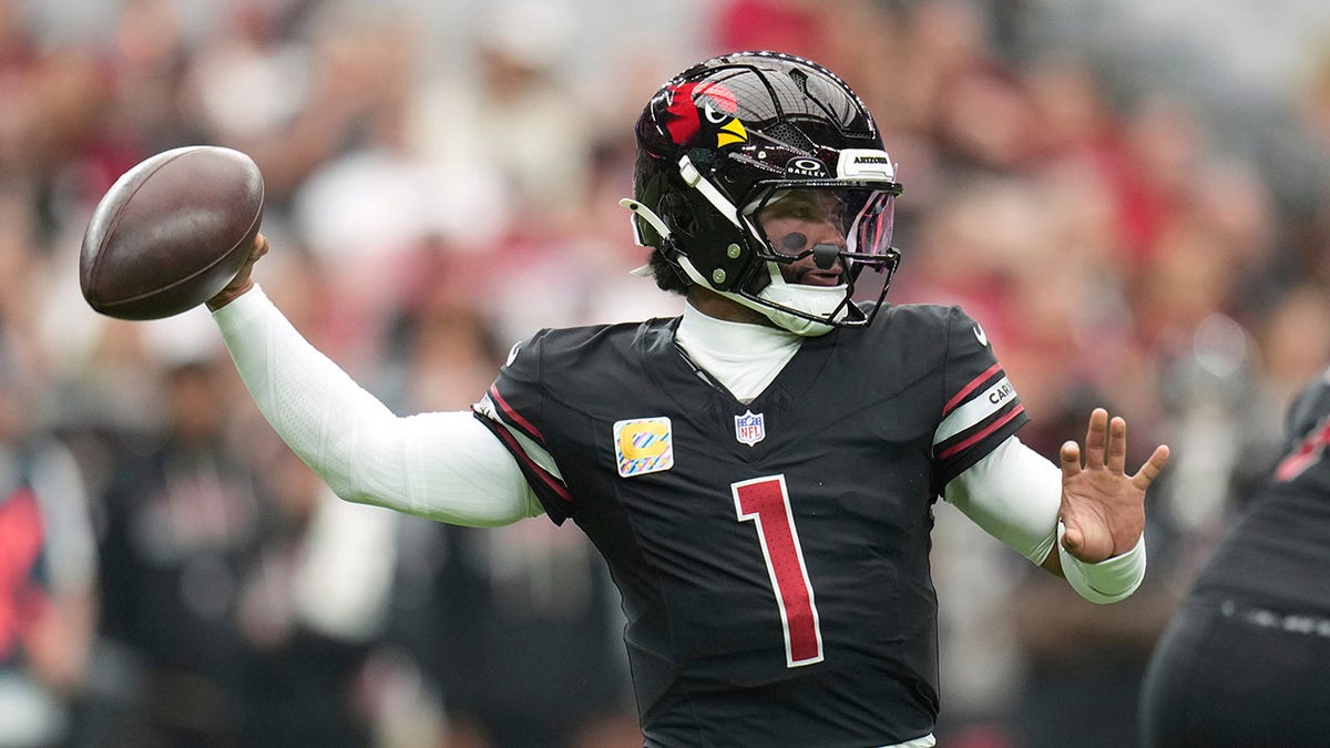 Kyler Murray throwing a pass during an NFL game in Glendale, Arizona