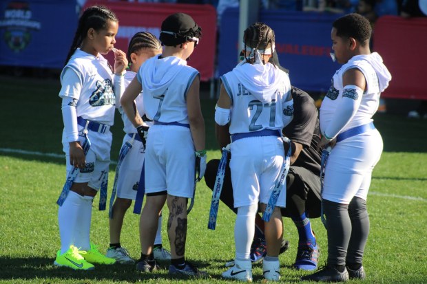 The Fitchburg based Central Mass Gators huddle up during the 4th Annual Youth Flag Football World Championships held earlier this month at the ESPN Wide World Of Sports Complex in Orlando. (SUBMITTED PHOTO)