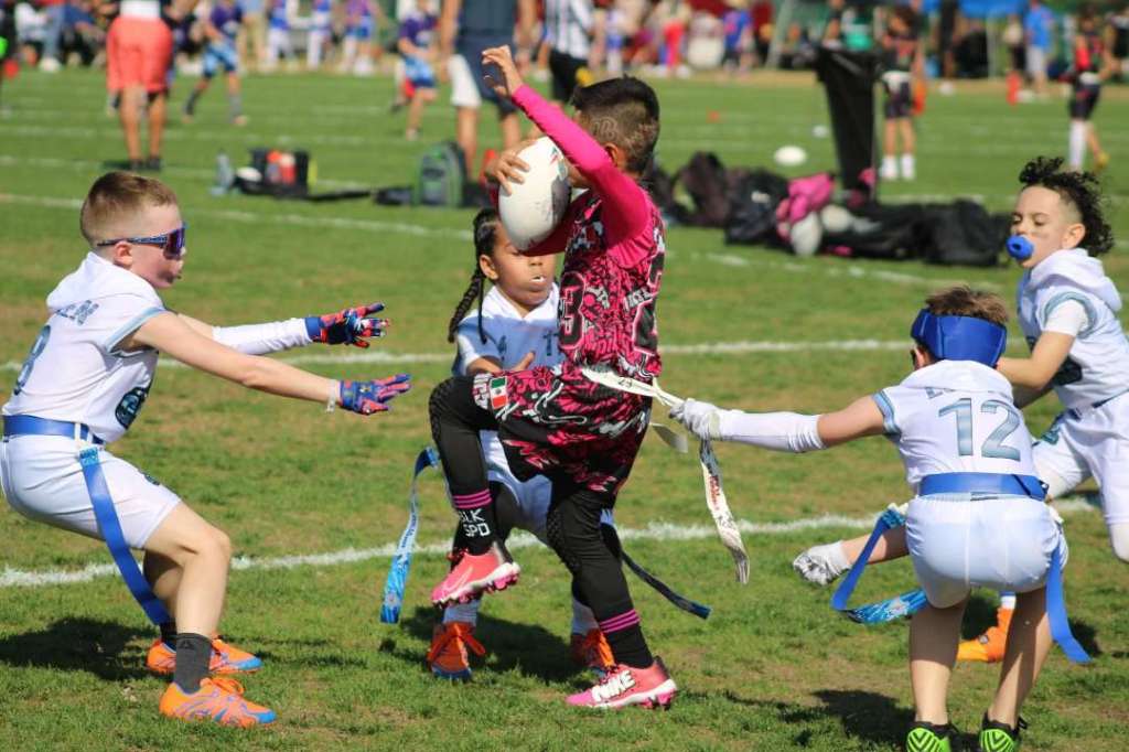 Fitchburg flag football teams bite down in Florida