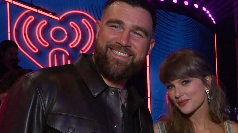 Taylor Swift and Travis Kelce attend the iHeartRadio Music Awards as her Spotify streams surge following the appearance