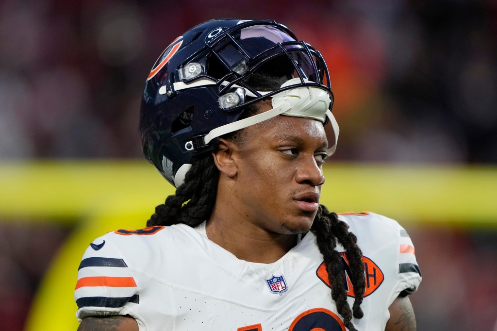Chicago Bears player Tremaine Edmunds looking on before a game.