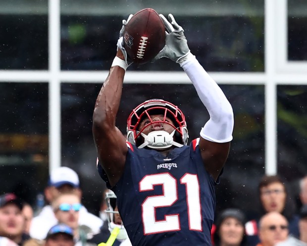 New England Patriots safety Jaylinn Hawkins makes an interception during the first quarter of a Sept. 7, 2025 game at Gillette Stadium. (Nancy Lane/Boston Herald)