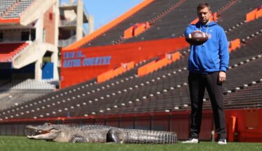 Florida's Jon Sumrall takes a tense photoshoot with a 7-foot alligator