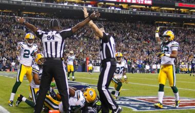 Officials indicate opposite rulings during the Green Bay Packers' 14-12 loss to the Seattle Seahawks on September 24, 2012