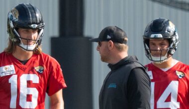 Jacksonville Jaguars quarterback Trevor Lawrence (16) and Jacksonville Jaguars head coach Liam Coen talk while quarterback Nick Mullens listens during the Jaguar’s 12th NFL training camp session at the Miller Electric Center, Thursday, Aug. 7, 2025, in Jacksonville, Fla.
