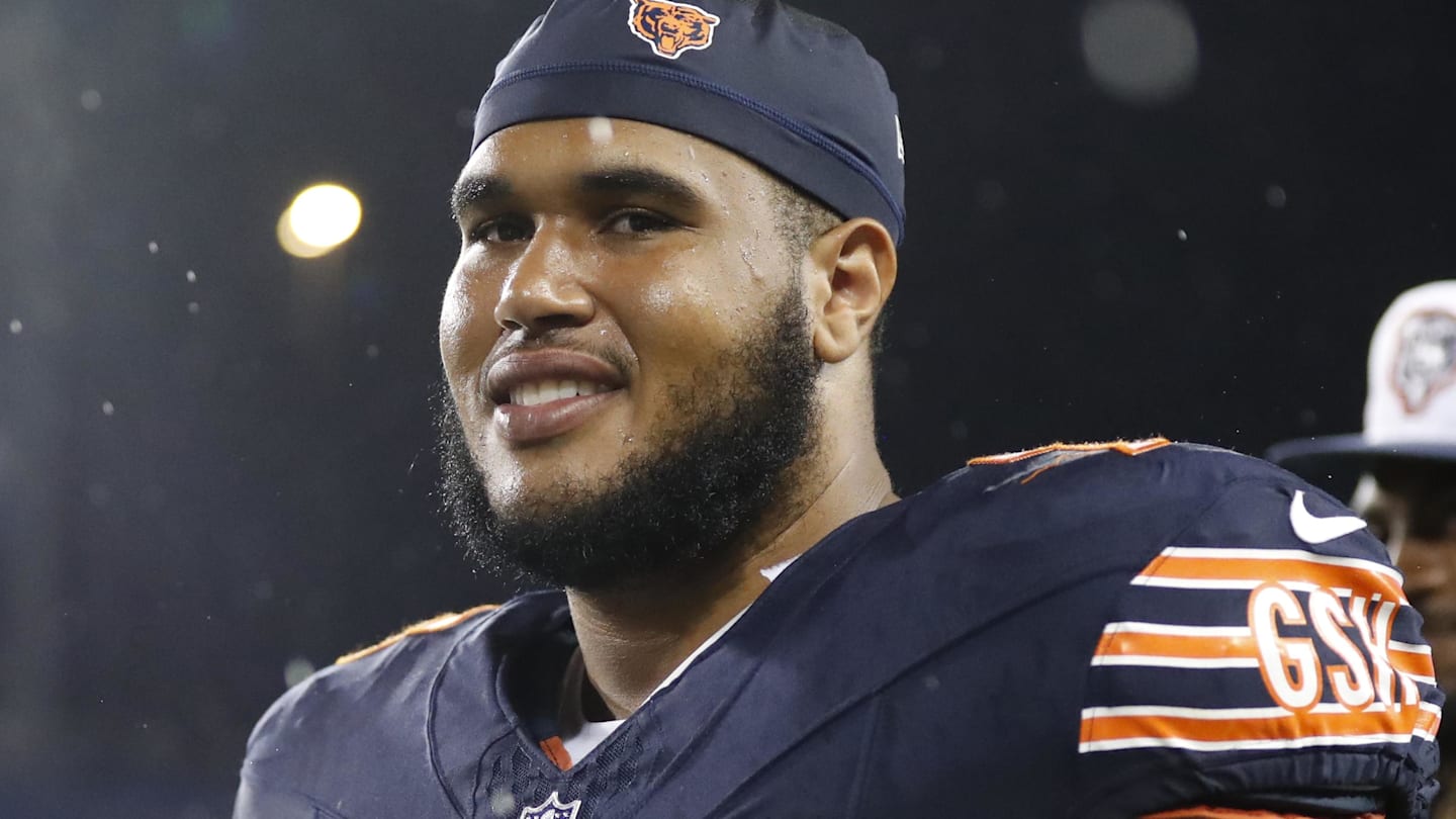 Aug 1, 2024; Canton, Ohio, USA;  Chicago Bears offensive tackle Larry Borom (75) joins teammates in exiting the field due to lightning during the third quarter against the Houston Texans at Tom Benson Hall of Fame Stadium.