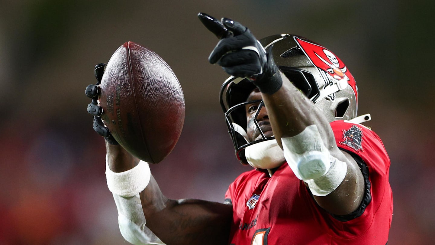 Oct 21, 2024; Tampa, Florida, USA; Tampa Bay Buccaneers wide receiver Chris Godwin (14) celebrates a first down against the Baltimore Ravens in the second quarter at Raymond James Stadium. Mandatory Credit: Nathan Ray Seebeck-Imagn Images