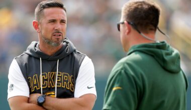 Green Bay Packers Coach Matt LaFleur, left, talks with General Manager Brian Gutekunst during practice on July 25, 2025, at Ray Nitschke Field in Ashwaubenon, Wis.