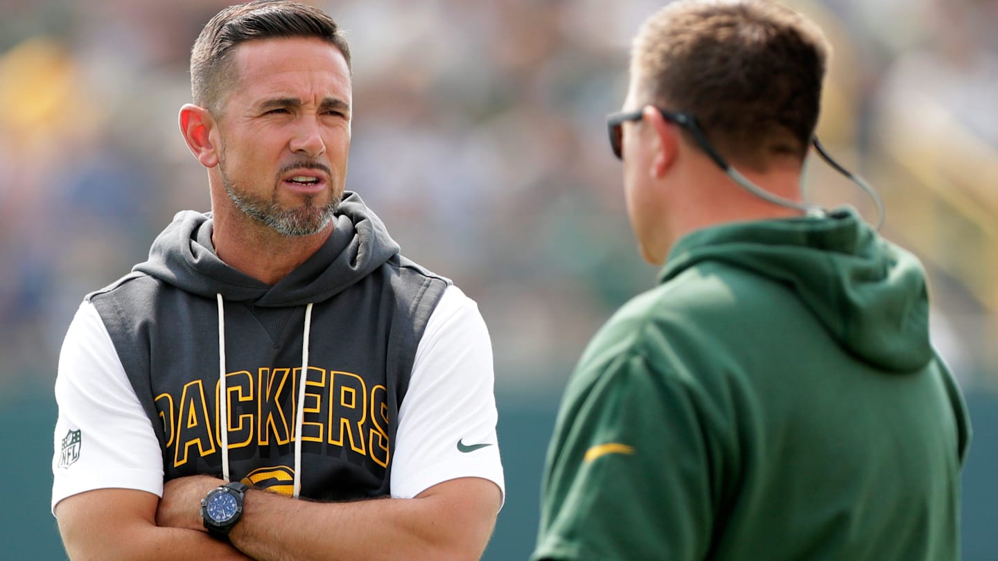 Green Bay Packers Coach Matt LaFleur, left, talks with General Manager Brian Gutekunst during practice on July 25, 2025, at Ray Nitschke Field in Ashwaubenon, Wis.
