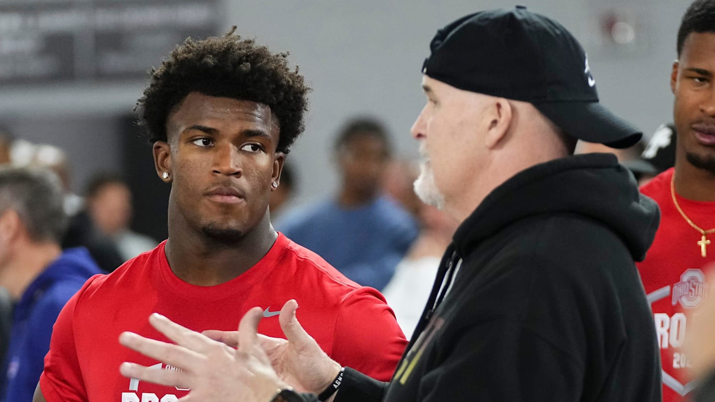 Ohio State Buckeyes safety Caleb Downs and Washington Commanders head coach Dan Quinn