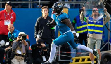 Jacksonville Jaguars running back Travis Etienne Jr. (1) scores a touchdown during the fourth quarter of an NFL football AFC Wild Card playoff matchup, Sunday, Jan. 11, 2026, in Jacksonville, Fla. The Bills defeated the Jaguars 27-24.