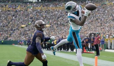 Carolina Panthers wide receiver Tetairoa McMillan is unable to catch a would-be touchdown while being covered by Green Bay Packers cornerback Nate Hobbs (21) during the second quarter of their game Sunday, November 2, 2025 at Lambeau Field in Green Bay, Wisconsin.