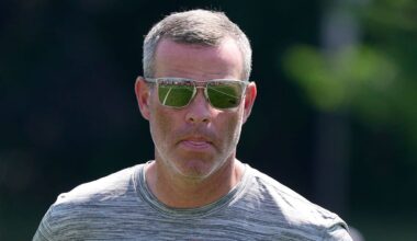 Brandon Beane, general manager of then Buffalo Bills, heads off the field at the end of practice at the Buffalo Bills training camp at St. John Fisher University in Pittsford on July 24, 2025.