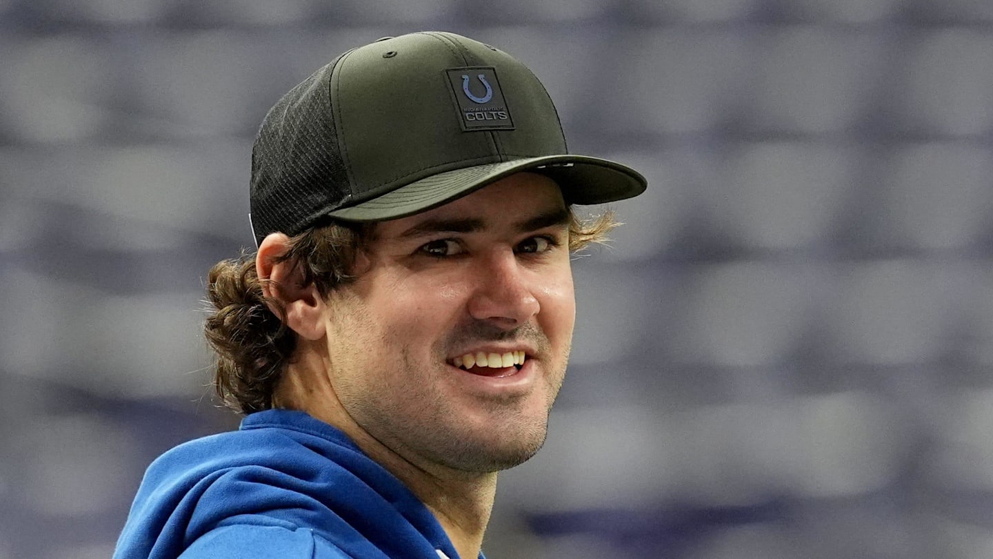 An injured Indianapolis Colts quarterback Daniel Jones talks