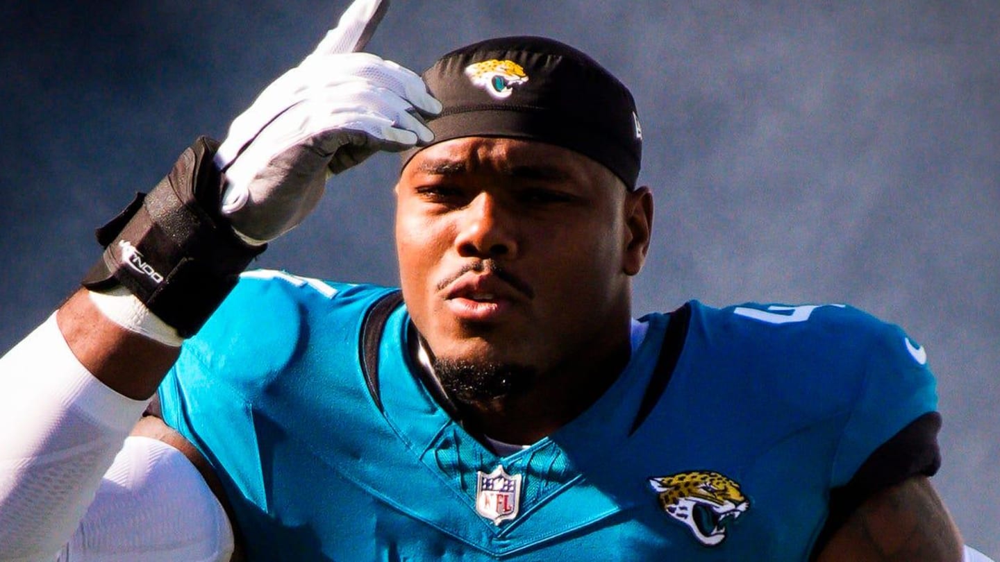 Jacksonville Jaguars defensive end Travon Walker (44) enters the stadium before an NFL football game at EverBank Stadium, Sunday, Dec. 14, 2025, in Jacksonville, Fla.