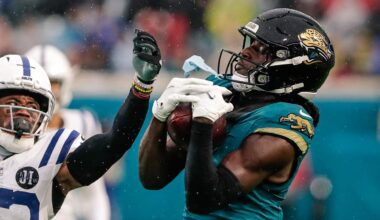 Dec 7, 2025; Jacksonville, Florida, USA; Jacksonville Jaguars wide receiver Brian Thomas Jr. (7) catches a pass over Indianapolis Colts cornerback Kenny Moore II (23) at EverBank Stadium.