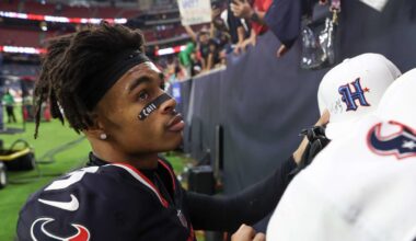 Dec 15, 2024; Houston, Texas, USA;  Houston Texans wide receiver Tank Dell (3) signs autographs after defeating the Miami Dolphins at NRG Stadium. Mandatory Credit: Thomas Shea-Imagn Images