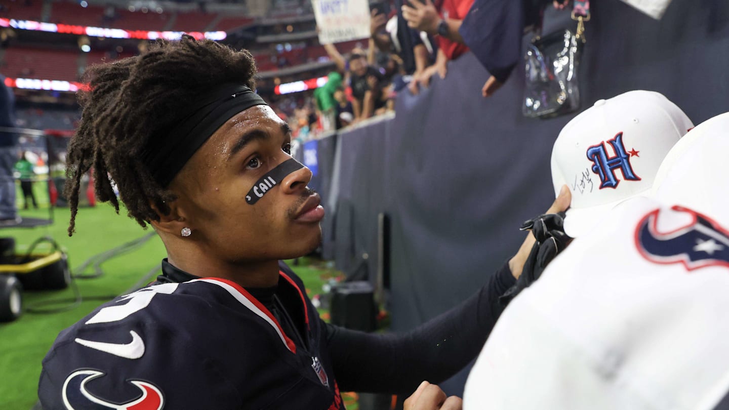 Dec 15, 2024; Houston, Texas, USA;  Houston Texans wide receiver Tank Dell (3) signs autographs after defeating the Miami Dolphins at NRG Stadium. Mandatory Credit: Thomas Shea-Imagn Images