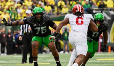 Oct 11, 2025; Eugene, Oregon, USA; Oregon Ducks offensive lineman Isaiah World (76) and defensive back Daylen Austin (0) block against Indiana Hoosiers defensive lineman Mikail Kamara (6) during the second quarter   at Autzen Stadium. Mandatory Credit: Troy Wayrynen-Imagn Images