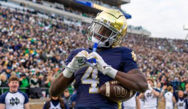 Nov 22, 2025; South Bend, Indiana, USA; Notre Dame Fighting Irish running back Jeremiyah Love (4) celebrates scoring against the Syracuse Orange during the first half at Notre Dame Stadium. Mandatory Credit: Michael Caterina-Imagn Images