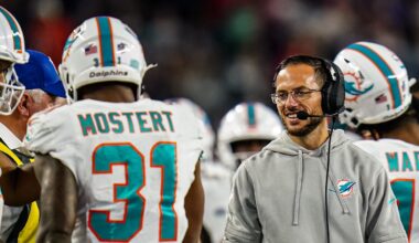 Miami Dolphins head coach Mike McDaniel reacts after a touchdown run by running back Raheem Mostert (31)