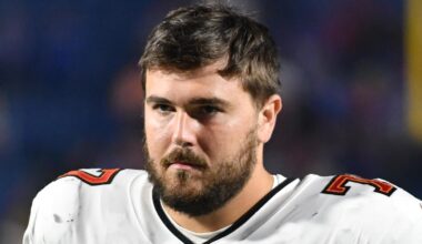Oct 26, 2023; Orchard Park, New York, USA; Tampa Bay Buccaneers offensive tackle Justin Skule (77) on the sidelines during a game against the Buffalo Bills at Highmark Stadium. Mandatory Credit: Mark Konezny-Imagn Images