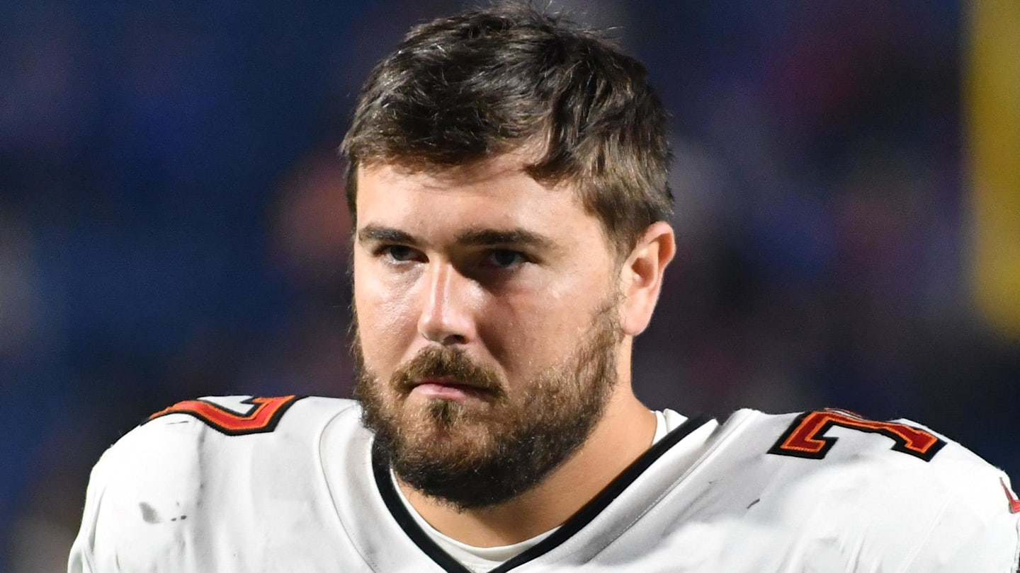 Oct 26, 2023; Orchard Park, New York, USA; Tampa Bay Buccaneers offensive tackle Justin Skule (77) on the sidelines during a game against the Buffalo Bills at Highmark Stadium. Mandatory Credit: Mark Konezny-Imagn Images