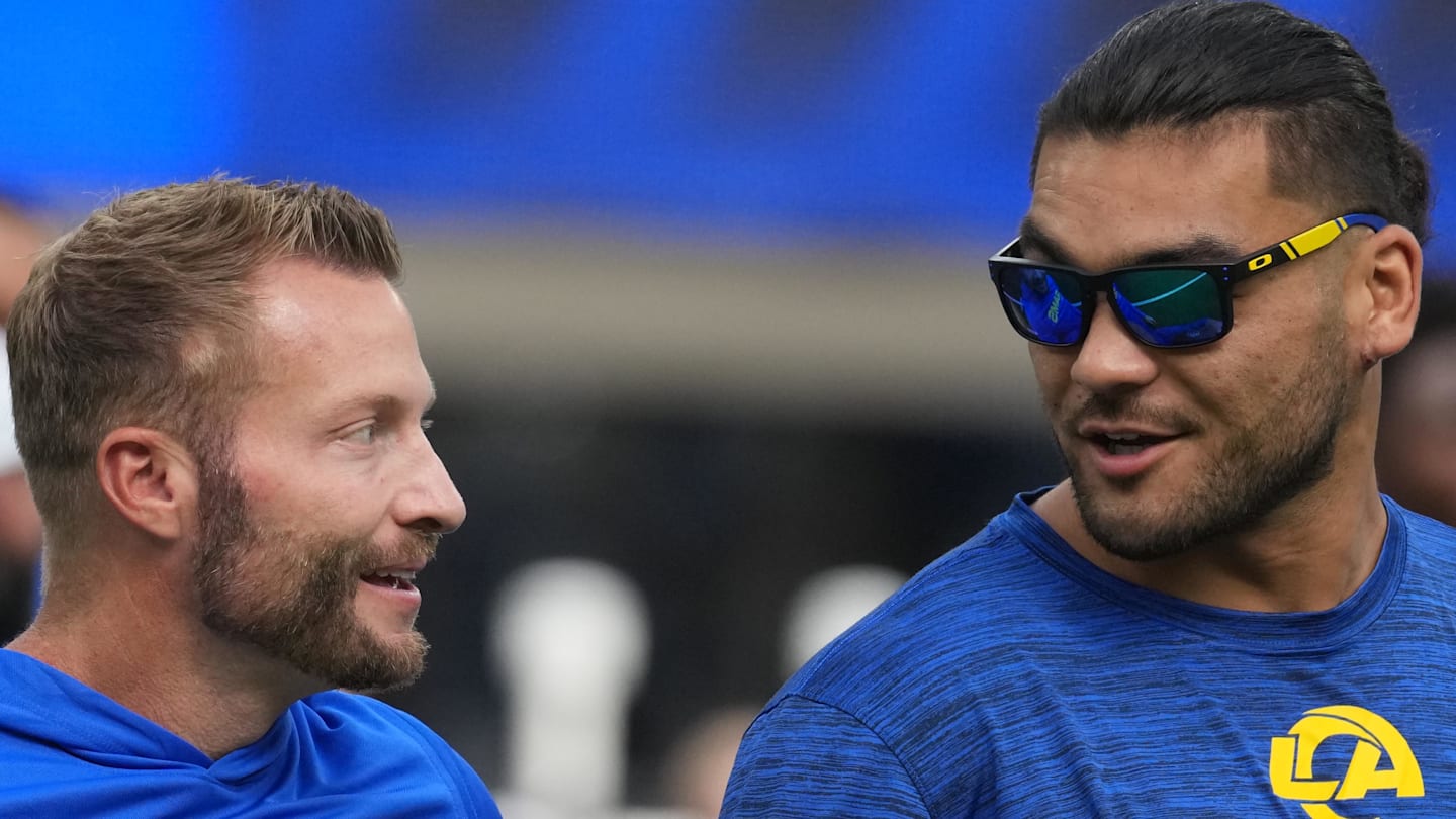 Los Angeles Rams coach Sean McVay (left) talks with wide receiver Puka Nacua (12). Mandatory Credit: Kirby Lee-Imagn Images