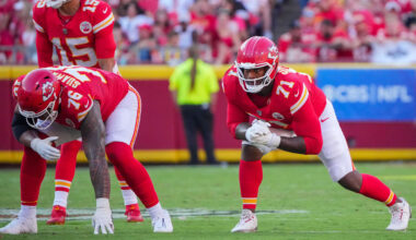 Sep 28, 2025; Kansas City, Missouri, USA; Kansas City Chiefs offensive tackle Kingsley Suamataia (76) and offensive tackle Josh Simmons (71) at the line of scrimmage against the Baltimore Ravens during the game at GEHA Field at Arrowhead Stadium. Mandatory Credit: Denny Medley-Imagn Images
