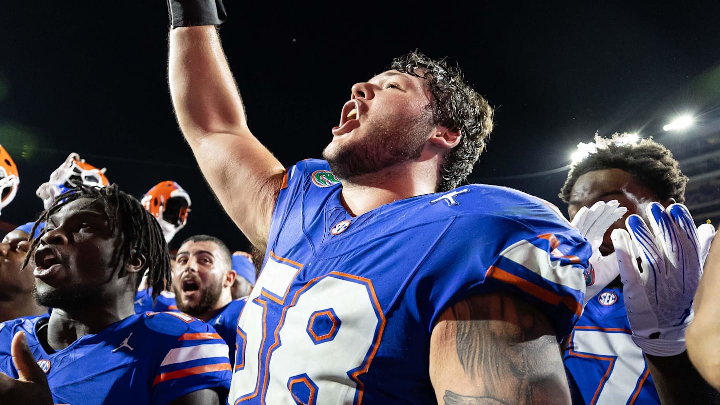 Nov 16, 2024; Gainesville, Florida, USA; Florida Gators offensive lineman Austin Barber (58) cheers with Florida Gators running back Jadan Baugh (13) after a game against the LSU Tigers at Ben Hill Griffin Stadium.