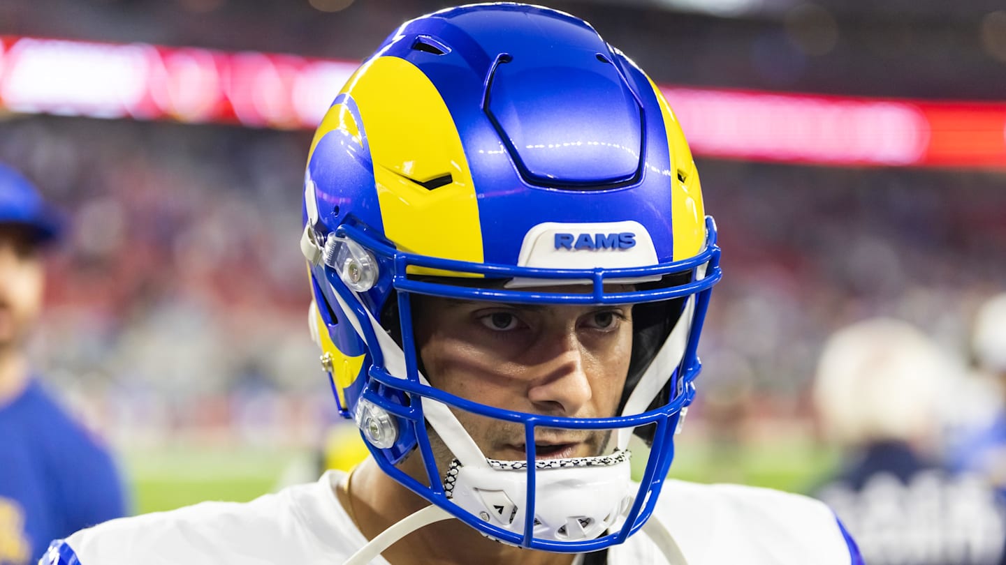 Dec 7, 2025; Glendale, Arizona, USA; Los Angeles Rams quarterback Jimmy Garoppolo (11) against the Arizona Cardinals at State Farm Stadium. Mandatory Credit: Mark J. Rebilas-Imagn Images