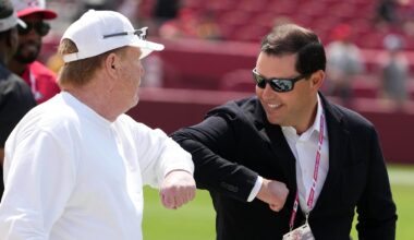 Las Vegas Raiders owner Mark Davis (left) bumps elbows with San Francisco 49ers chief executive officer Jed York  (right)