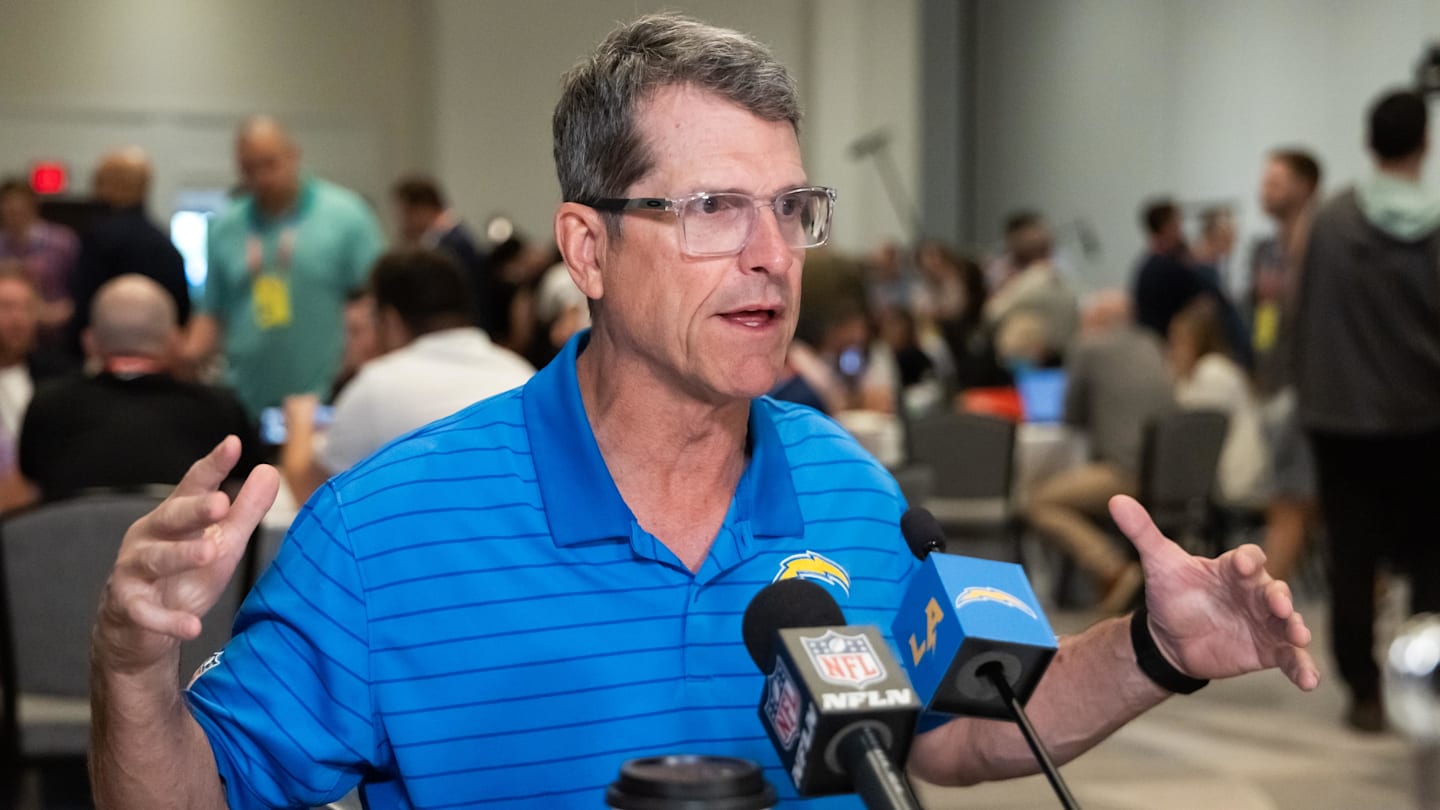 Mar 31, 2026; Phoenix, AZ, USA; Los Angeles Chargers head coach Jim Harbaugh speaks to reporters in the media during the 2026 NFL Annual League Meeting at the Arizona Biltmore. Mandatory Credit: Mark J. Rebilas-Imagn Images