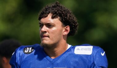 Indianapolis Colts offensive tackle Jalen Travis (75) walks up the field