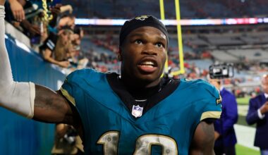Jacksonville Jaguars wide receiver Travis Hunter (12) high-fives fans after the game of an NFL football matchup at EverBank Stadium, Monday, Oct. 6, 2025, in Jacksonville, Fla. The Jacksonville Jaguars edged the Kansas City Chiefs 31-28. [Corey Perrine/Florida Times-Union]