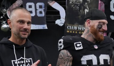 Dec 7, 2025; Paradise, Nevada, USA;  Las Vegas Raiders defensive end Maxx Crosby (98) along with his wife Rachel Washburn and daughter Ella Rose Crosby and Raiders general manager John Spytek receives the Walter Payton Man of the Year Award prior to a game against the Denver Broncos at Allegiant Stadium. Mandatory Credit: Kirby Lee-Imagn Images