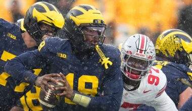 Ohio State Buckeyes defensive end Kenyatta Jackson Jr. (97) sacks Michigan Wolverines quarterback Bryce Underwood (19) during the NCAA football game at Michigan Stadium in Ann Arbor, Mich. on Nov. 29, 2025. Ohio State won 27-9.
