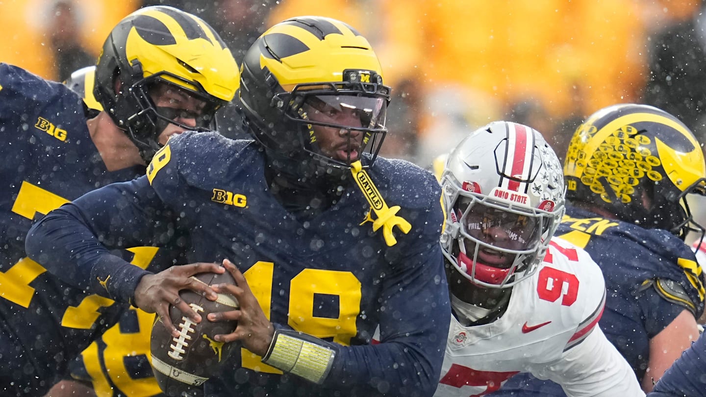 Ohio State Buckeyes defensive end Kenyatta Jackson Jr. (97) sacks Michigan Wolverines quarterback Bryce Underwood (19) during the NCAA football game at Michigan Stadium in Ann Arbor, Mich. on Nov. 29, 2025. Ohio State won 27-9.