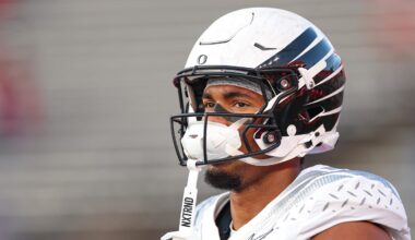 Oct 18, 2025; Piscataway, New Jersey, USA; Oregon Ducks tight end Kenyon Sadiq (18) warms up before the game against the Rutgers Scarlet Knights at SHI Stadium. Mandatory Credit: Vincent Carchietta-Imagn Images