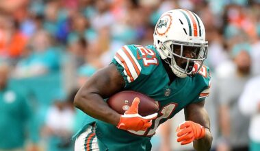 Dec 2, 2018; Miami Gardens, FL, USA; Miami Dolphins running back Frank Gore (21) carries the ball against the Buffalo Bills during the first half at Hard Rock Stadium. Mandatory Credit: Jasen Vinlove-Imagn Images