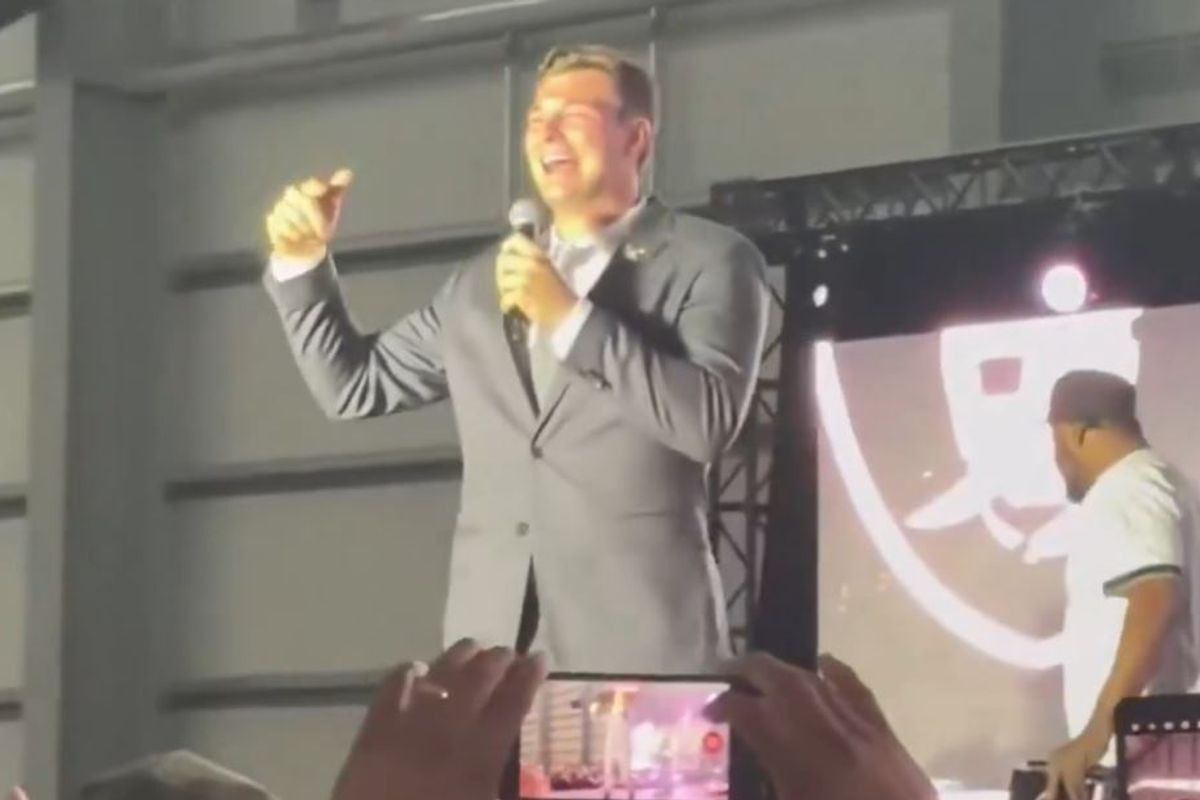 Fernando Mendoza speaks to Las Vegas Raiders fans from a stage at the team facility