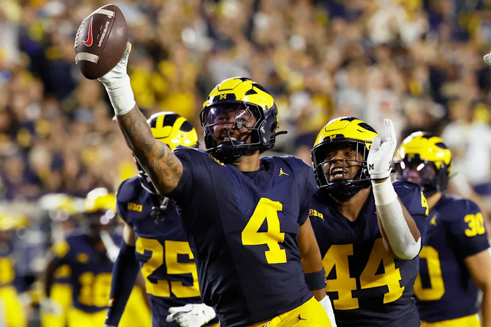 Aug 30, 2025; Ann Arbor, Michigan, USA; Michigan Wolverines edge TJ Guy (4) celebrates a fumble recovery in the first half against the New Mexico Lobos at Michigan Stadium. Mandatory Credit: Rick Osentoski-Imagn Images