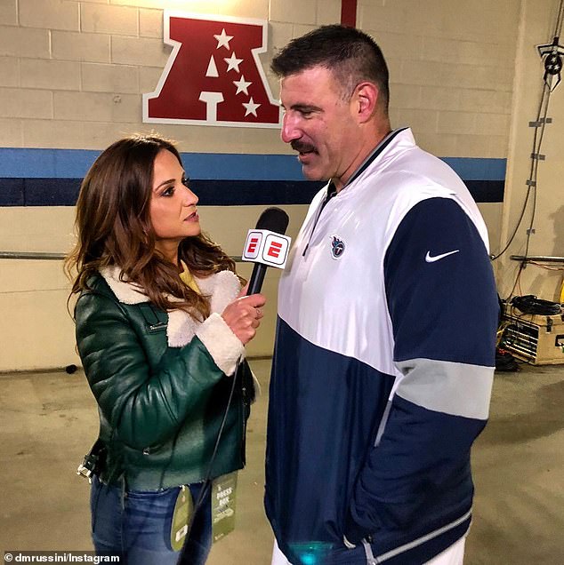 Russini is pictured interviewing Vrabel in 2019, when he was coaching the Titans