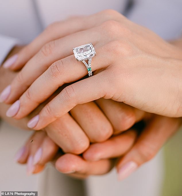According to Gemporia's gemstone expert Toby Cavill, the ring, set on a diamond band with emerald detailing, is estimated to be worth anywhere from a whopping $200,000 to $335,000